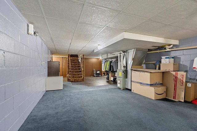 W6023 Lake Dr, Shawano, WI 54166 - finished below grade area with stairway, concrete block wall, and a paneled ceiling