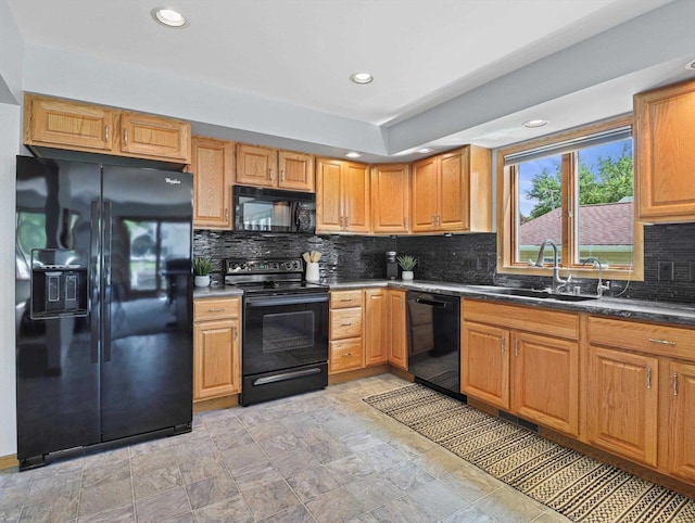 1306 Neponset Trl, Monona, WI 53716 - kitchen featuring black appliances, a sink, backsplash, recessed lighting, and dark countertops