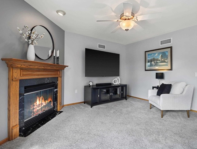 1306 Neponset Trl, Monona, WI 53716 - carpeted living area with baseboards, a high end fireplace, and a ceiling fan