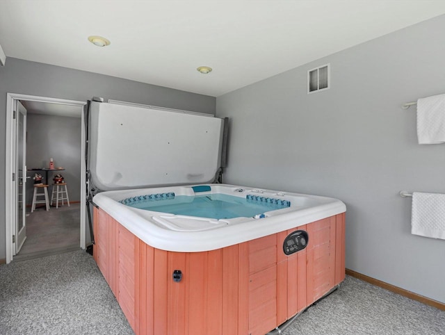 1306 Neponset Trl, Monona, WI 53716 - miscellaneous room with light carpet and baseboards