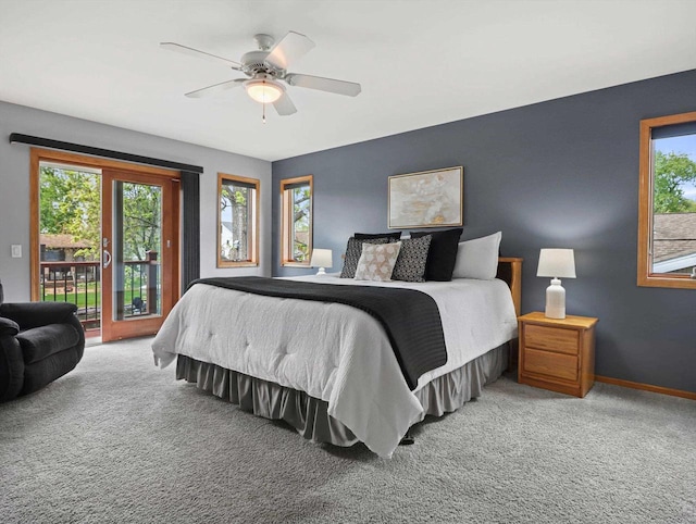 1306 Neponset Trl, Monona, WI 53716 - carpeted bedroom featuring access to outside, baseboards, and ceiling fan