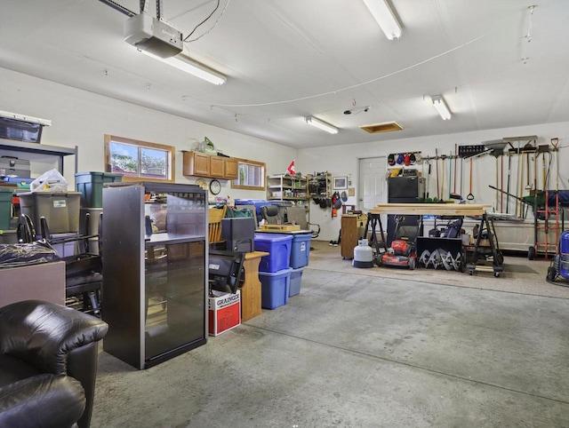 1306 Neponset Trl, Monona, WI 53716 - garage featuring a garage door opener