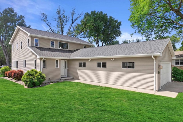 1306 Neponset Trl, Monona, WI 53716 - view of front of property with a front lawn, a shingled roof, and an attached garage