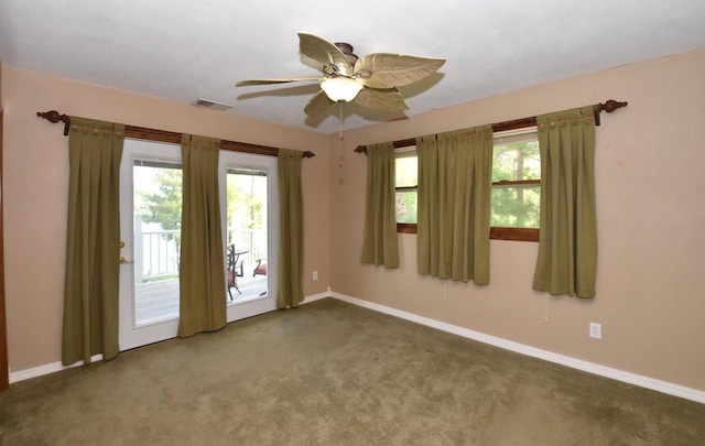 2462 Wallace Lake Rd, West Bend, WI 53090 - carpeted empty room featuring baseboards and ceiling fan