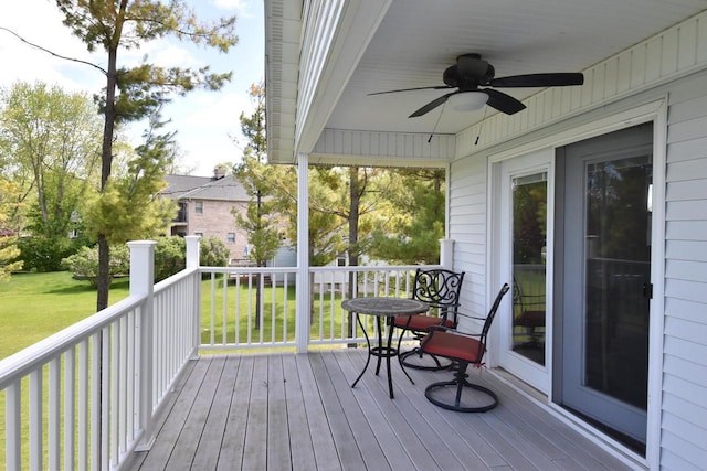 2462 Wallace Lake Rd, West Bend, WI 53090 - deck with ceiling fan and a yard