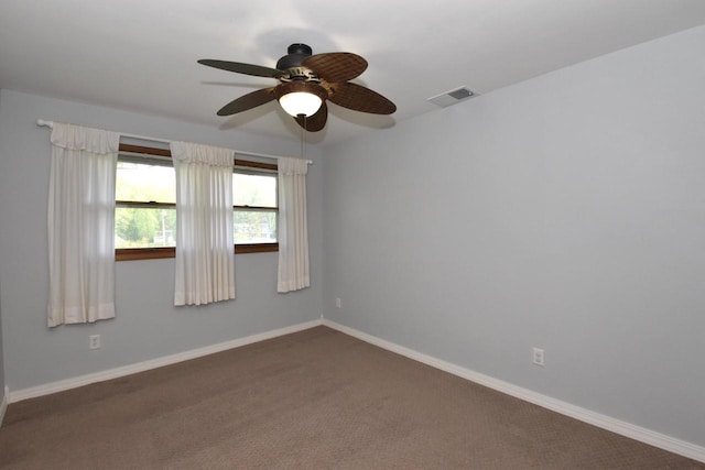 2462 Wallace Lake Rd, West Bend, WI 53090 - carpeted empty room featuring a ceiling fan and baseboards