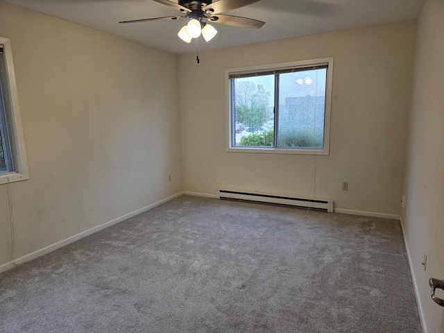 10416 W Whitnall Edge Ct Unit 102, Franklin, WI 53132 - carpeted empty room featuring a baseboard radiator, ceiling fan, and baseboards