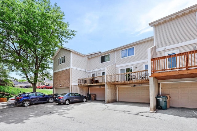 6911 Raymond Rd, Madison, WI 53711 - back of property with a garage