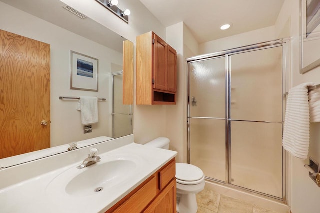 6911 Raymond Rd, Madison, WI 53711 - bathroom with toilet, vanity, a stall shower, and tile patterned flooring