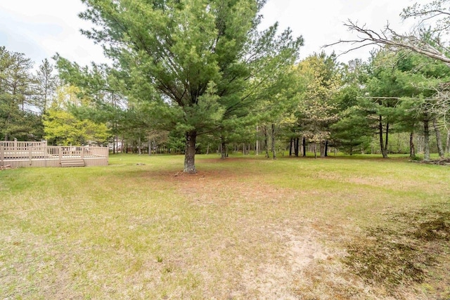 618 Little Fawn Dr, Nekoosa, WI 54457 - view of grassy yard with a deck