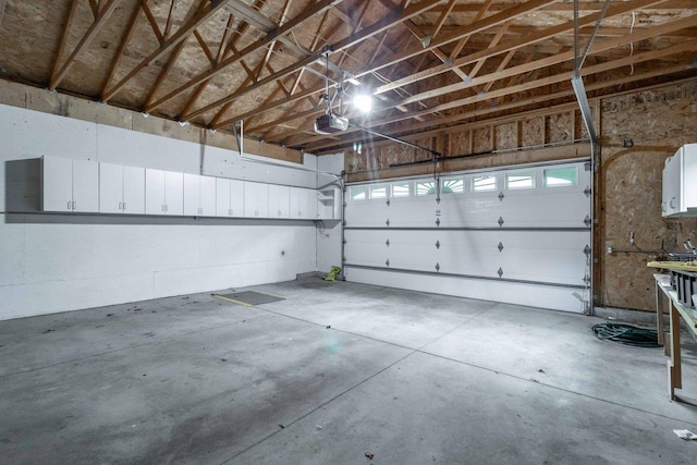 618 Little Fawn Dr, Nekoosa, WI 54457 - garage featuring a garage door opener