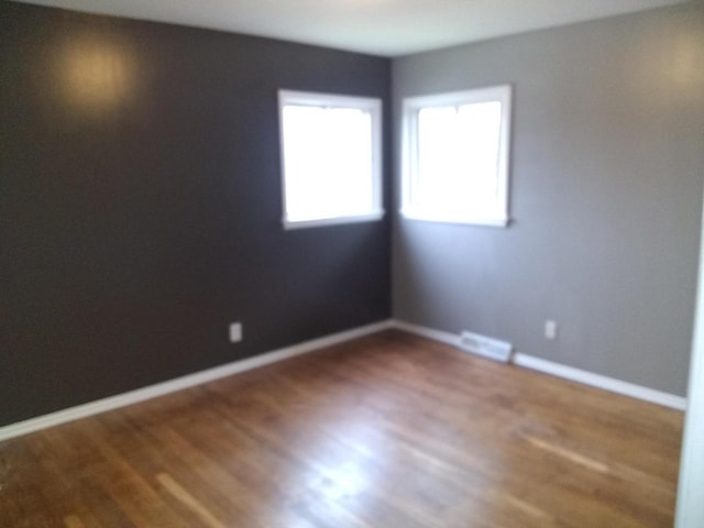 8594 W Villard Ave, Milwaukee, WI 53225 - empty room featuring wood finished floors and baseboards