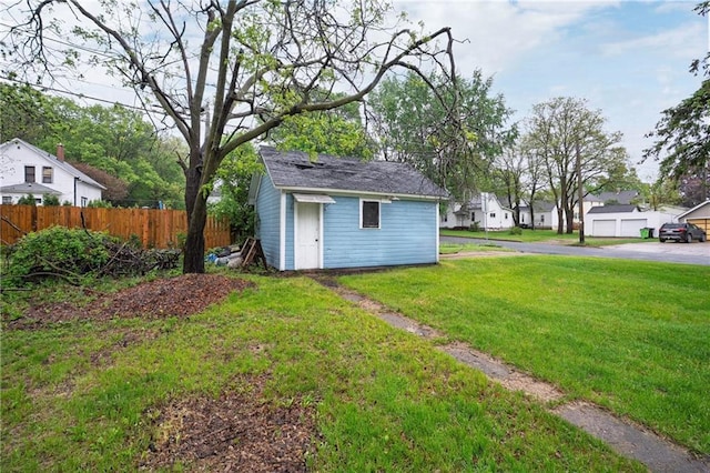 1020 E 10th St, Menomonie, WI 54751 - view of yard featuring an outdoor structure and a residential view