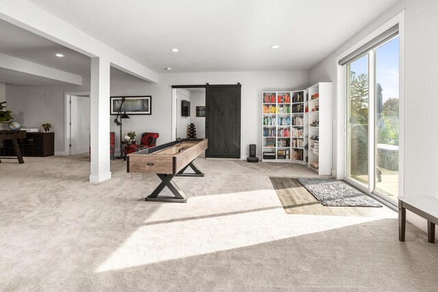 W239N7521 High Ridge Dr, Sussex, WI 53089 - playroom with carpet, a barn door, recessed lighting, and baseboards