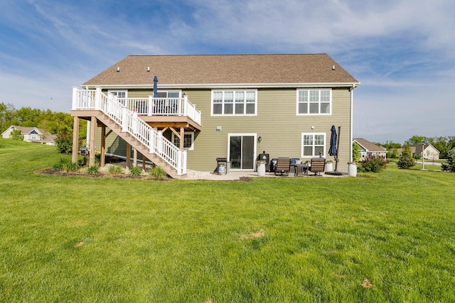 W239N7521 High Ridge Dr, Sussex, WI 53089 - back of property featuring stairs, a wooden deck, a yard, and a patio area