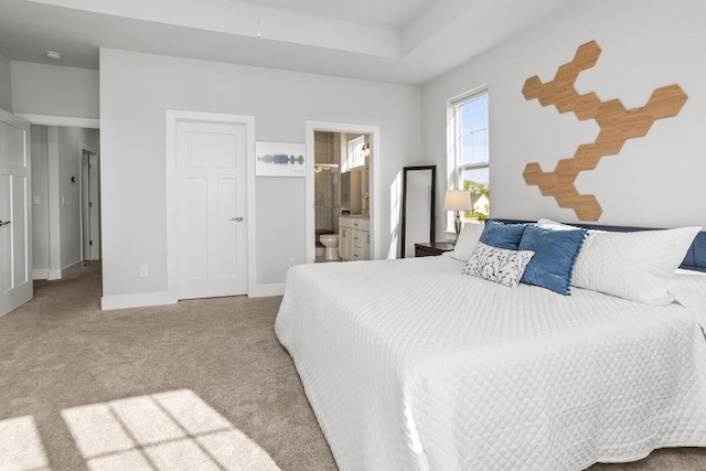 W239N7521 High Ridge Dr, Sussex, WI 53089 - carpeted bedroom featuring connected bathroom and baseboards