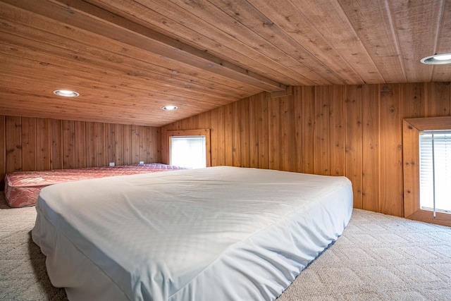 134 Glen View Dr Unit 44, Wisconsin Dells, WI 53965 - carpeted bedroom with wood ceiling, multiple windows, wood walls, lofted ceiling, and recessed lighting