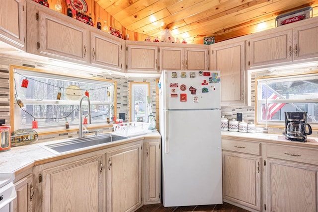 134 Glen View Dr Unit 44, Wisconsin Dells, WI 53965 - kitchen with freestanding refrigerator, a sink, wood ceiling, tile counters, and light brown cabinetry