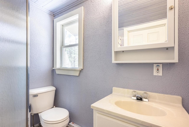134 Glen View Dr Unit 44, Wisconsin Dells, WI 53965 - bathroom featuring toilet, vanity, and a textured wall