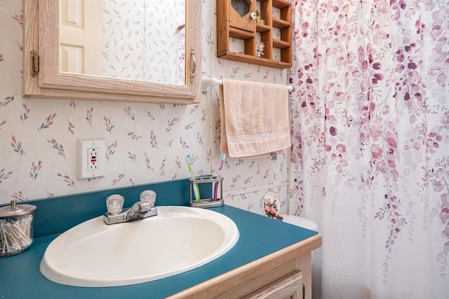 134 Glen View Dr Unit 44, Wisconsin Dells, WI 53965 - bathroom featuring wallpapered walls and vanity
