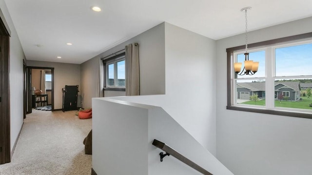 20170 63rd Ave, Chippewa Falls, WI 54729 - hall featuring an upstairs landing, a chandelier, recessed lighting, and light colored carpet