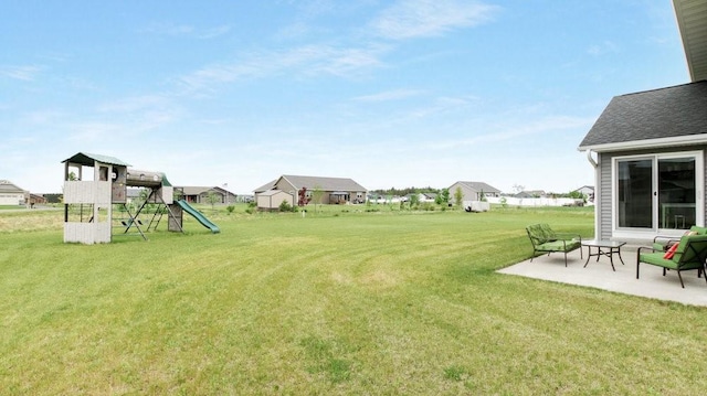 20170 63rd Ave, Chippewa Falls, WI 54729 - view of green lawn with a playground, a patio, and a residential view