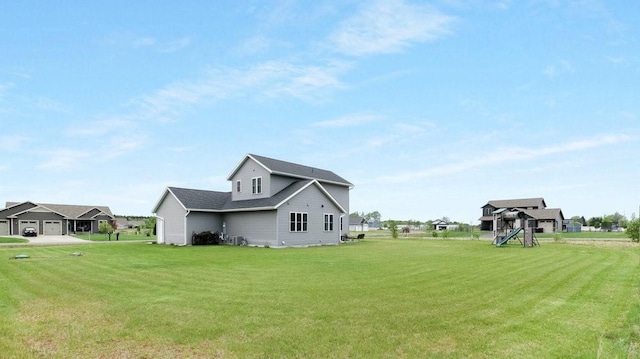 20170 63rd Ave, Chippewa Falls, WI 54729 - view of side of home with a lawn and a playground