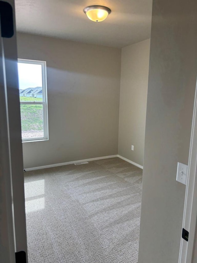 1236 Northwood Dr, Seymour, WI 54165 - carpeted spare room featuring baseboards