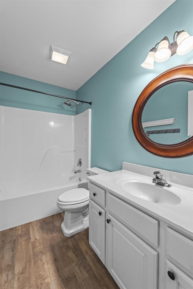 5806 E Open Mdw, Mcfarland, WI 53558 - bathroom with wood finished floors, vanity, toilet, and shower / bath combination