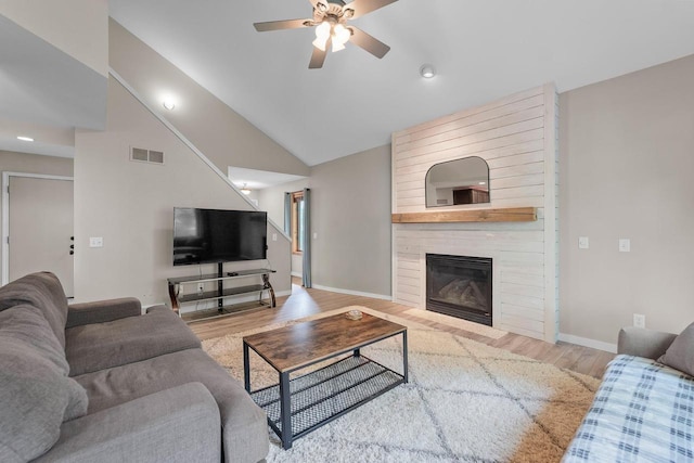 5806 E Open Mdw, Mcfarland, WI 53558 - living area with a ceiling fan, wood finished floors, baseboards, recessed lighting, and a fireplace