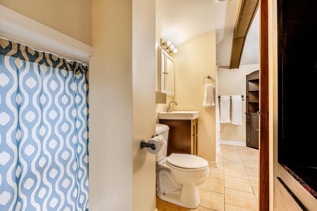 415 Ferry St, La Crosse, WI 54601 - bathroom featuring tile patterned floors, a sink, and toilet