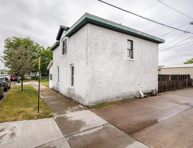 415 Ferry St, La Crosse, WI 54601 - view of property exterior featuring stucco siding