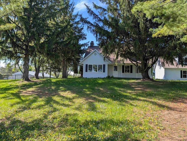 N79W33915 Petersen Rd, Oconomowoc, WI 53066 - view of front of home featuring a chimney