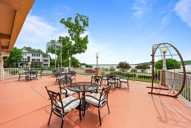335 Wrigley Dr Unit 411, Lake Geneva, WI 53147 - view of patio with outdoor dining area