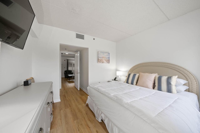 335 Wrigley Dr Unit 411, Lake Geneva, WI 53147 - bedroom with light wood-style floors