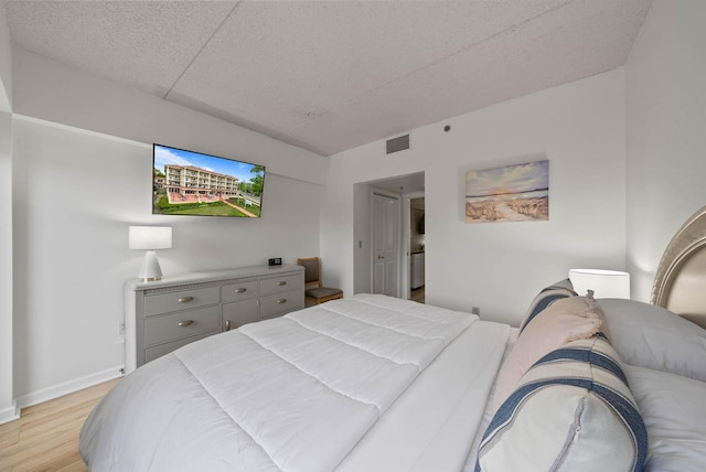 335 Wrigley Dr Unit 411, Lake Geneva, WI 53147 - bedroom with light wood finished floors and baseboards
