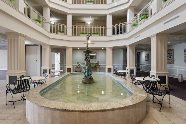 335 Wrigley Dr Unit 411, Lake Geneva, WI 53147 - building lobby with a towering ceiling and a decorative wall