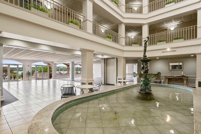 335 Wrigley Dr Unit 411, Lake Geneva, WI 53147 - community lobby featuring a towering ceiling