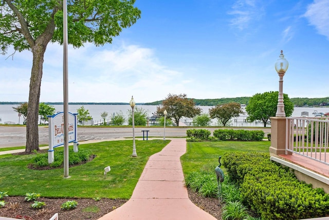 335 Wrigley Dr Unit 411, Lake Geneva, WI 53147 - view of property's community with a water view and a lawn