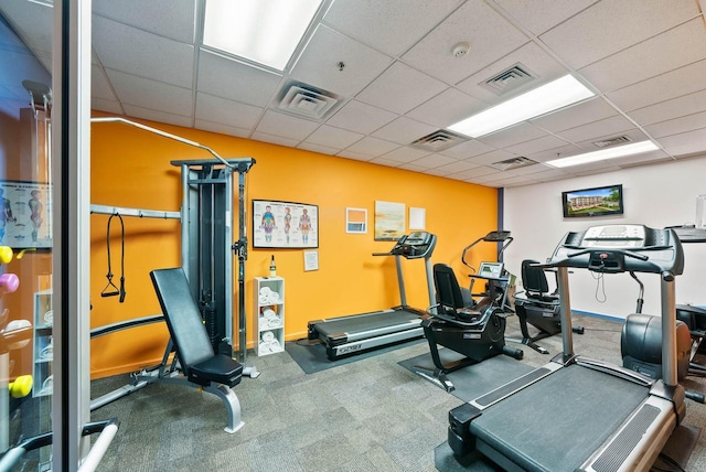 335 Wrigley Dr Unit 411, Lake Geneva, WI 53147 - exercise room featuring a paneled ceiling, baseboards, and carpet