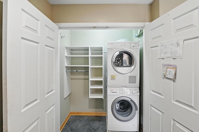 1420 N Astor St, Milwaukee, WI 53202 - laundry area with stacked washer / drying machine and baseboards