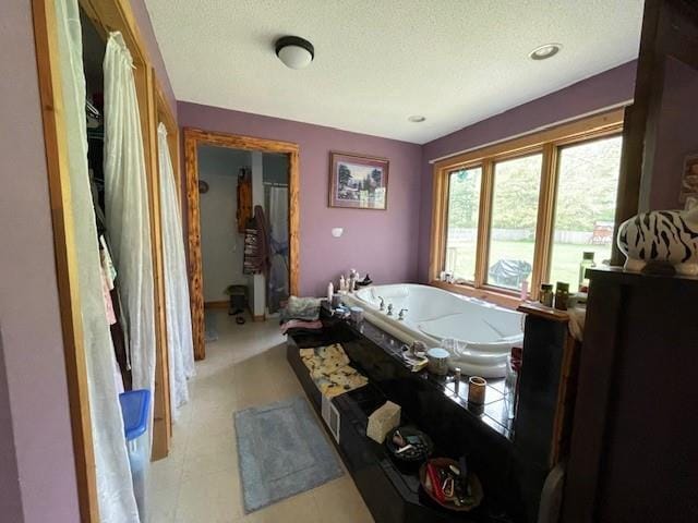 13550 W Froemel Rd, Hayward, WI 54843 - full bathroom featuring a textured ceiling and a tub