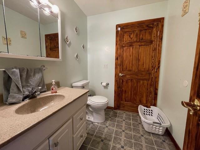 13550 W Froemel Rd, Hayward, WI 54843 - bathroom featuring vanity and toilet