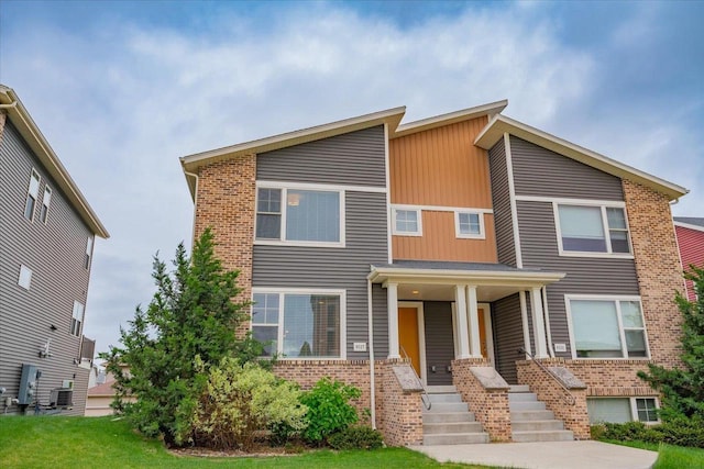 9327 Silicon Prairie Pkwy, Verona, WI 53593 - view of front of property featuring brick siding and central air condition unit