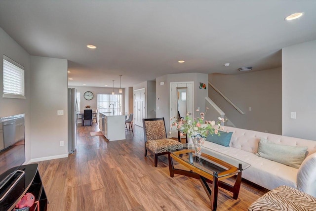9327 Silicon Prairie Pkwy, Verona, WI 53593 - living area featuring light wood-style flooring and recessed lighting