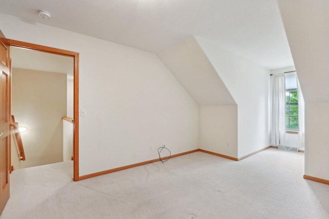 1408 Groves Ln Unit 12, Union Grove, WI 53182 - bonus room featuring light colored carpet and baseboards