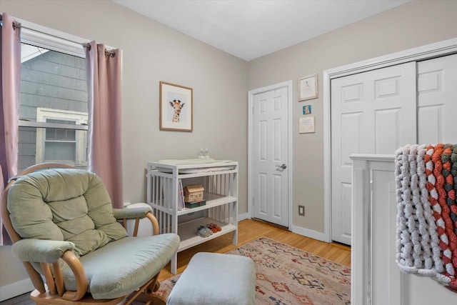 2207 N 51st St, Milwaukee, WI 53208 - bedroom featuring wood finished floors, baseboards, and a closet