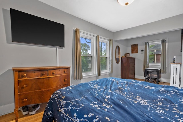 2207 N 51st St, Milwaukee, WI 53208 - bedroom featuring wood finished floors