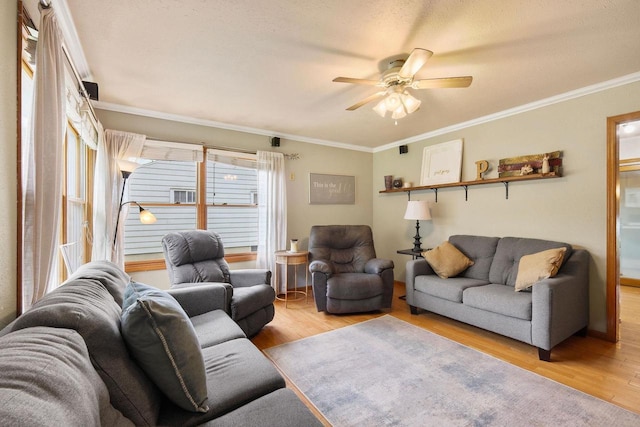 3609 Brigham Ave, Madison, WI 53714 - living room with wood finished floors, ceiling fan, and crown molding