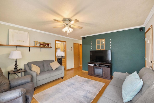 3609 Brigham Ave, Madison, WI 53714 - living area with a ceiling fan, light wood-type flooring, and ornamental molding